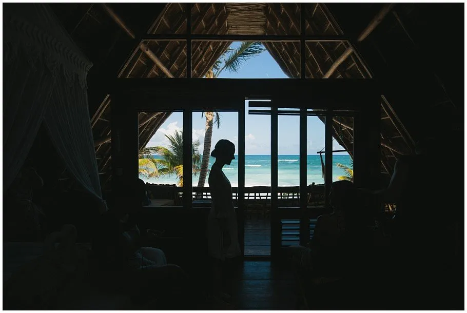 Ahau Tulum wedding photographer: the bride is getting ready for the ceremony oceanview