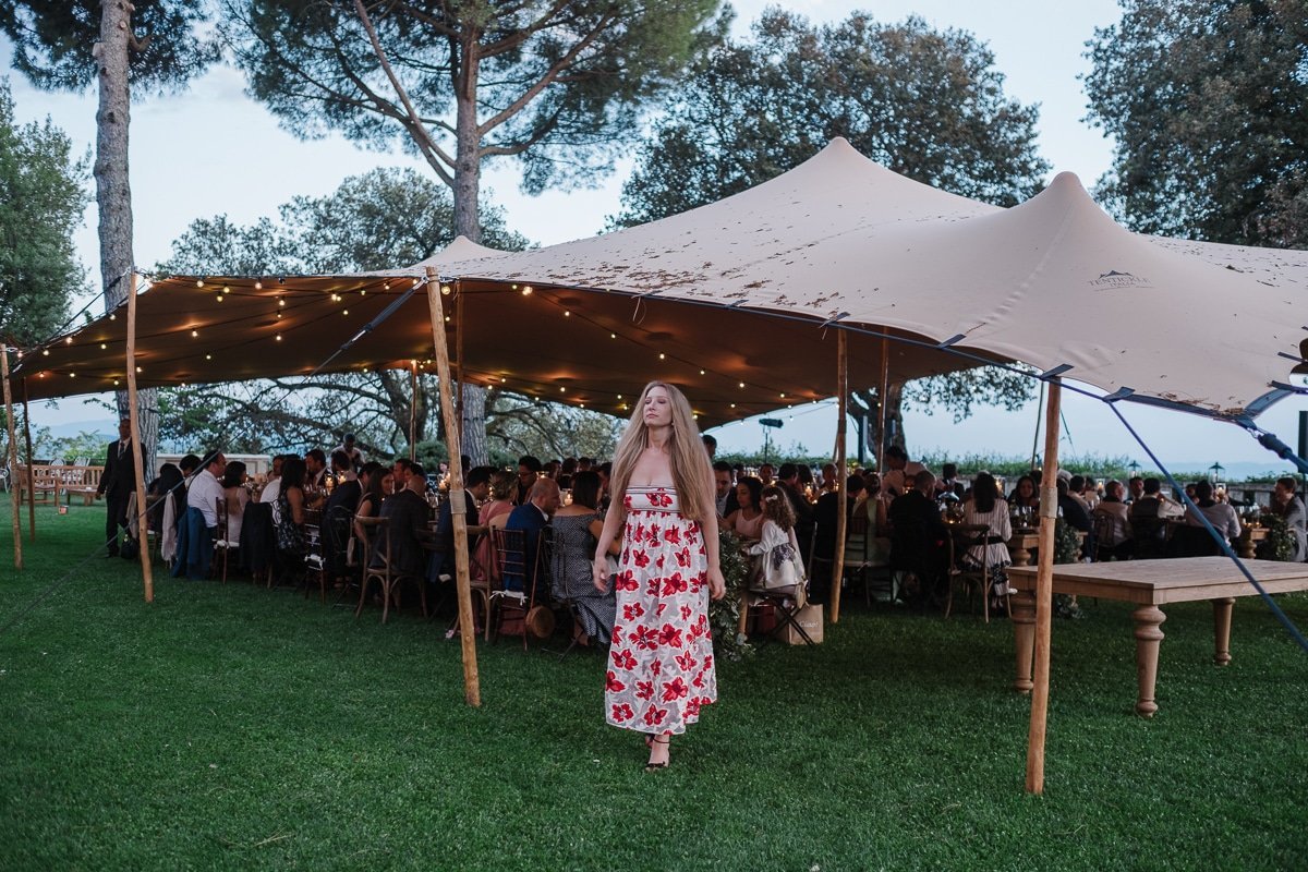 Marquee on the lawn in front of the villa at Borgo Pignano