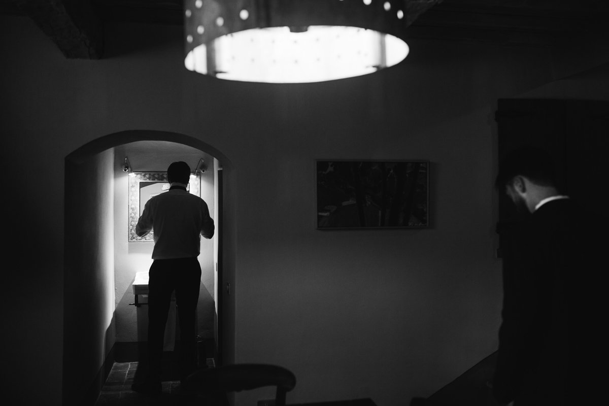 Silhouette in a doorway of the villa, black and white