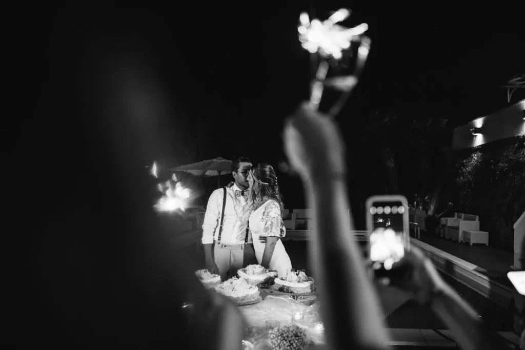 cake cutting during a wedding in castiglioncello
