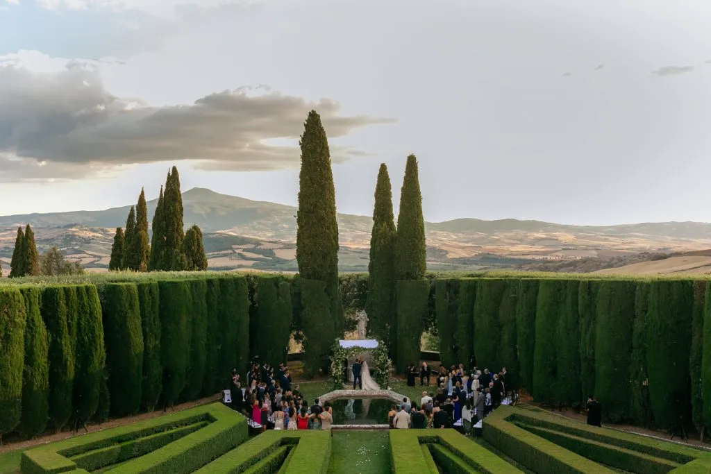 la foce wedding photographer Tuscany: a dream wedding celebration in a stunning garden ovelooking tuscan country
