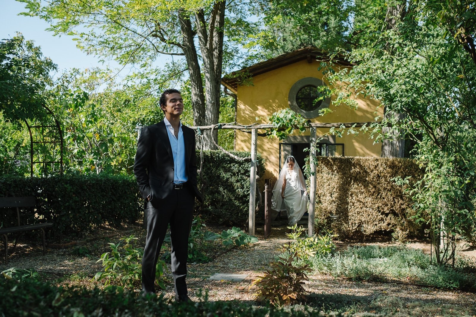 Groom waiting in the garden