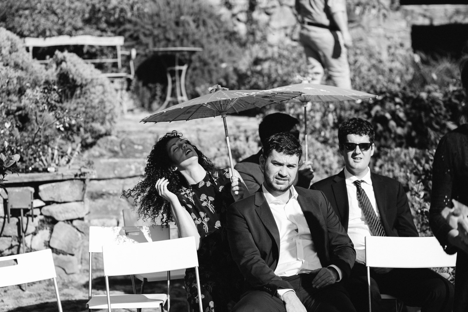 Guests waiting for the ceremony, black and white