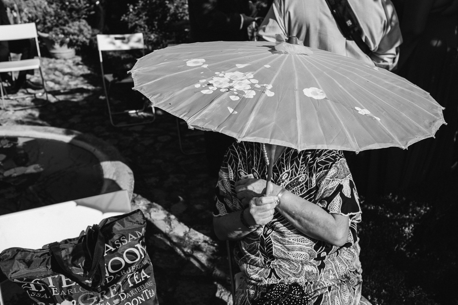 Guest with a parasol, black and white