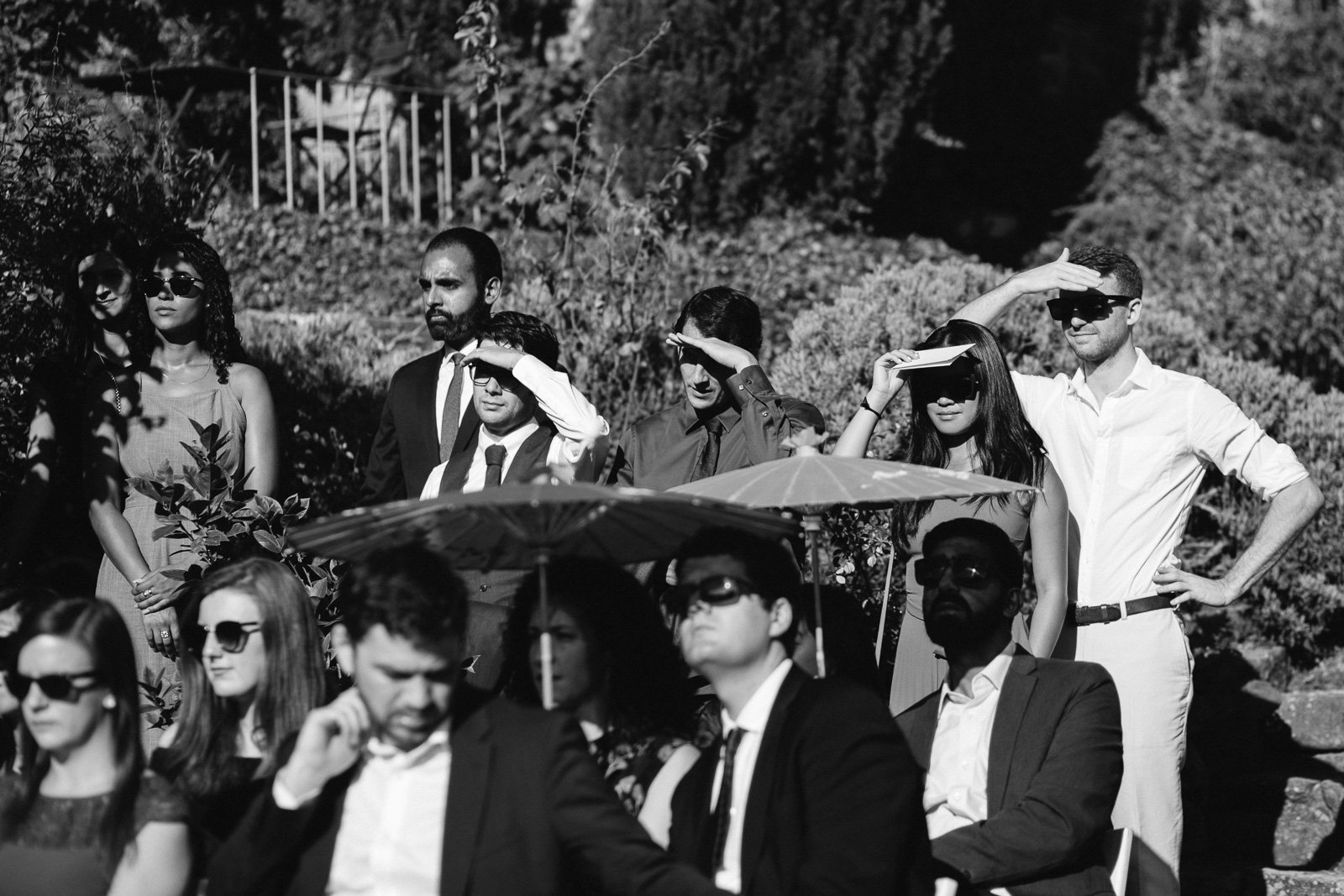 Guests watching the ceremony, black and white