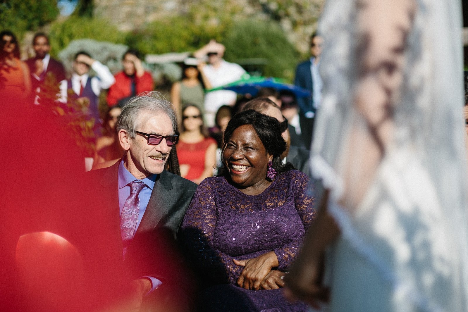 Guests laughing during the ceremony