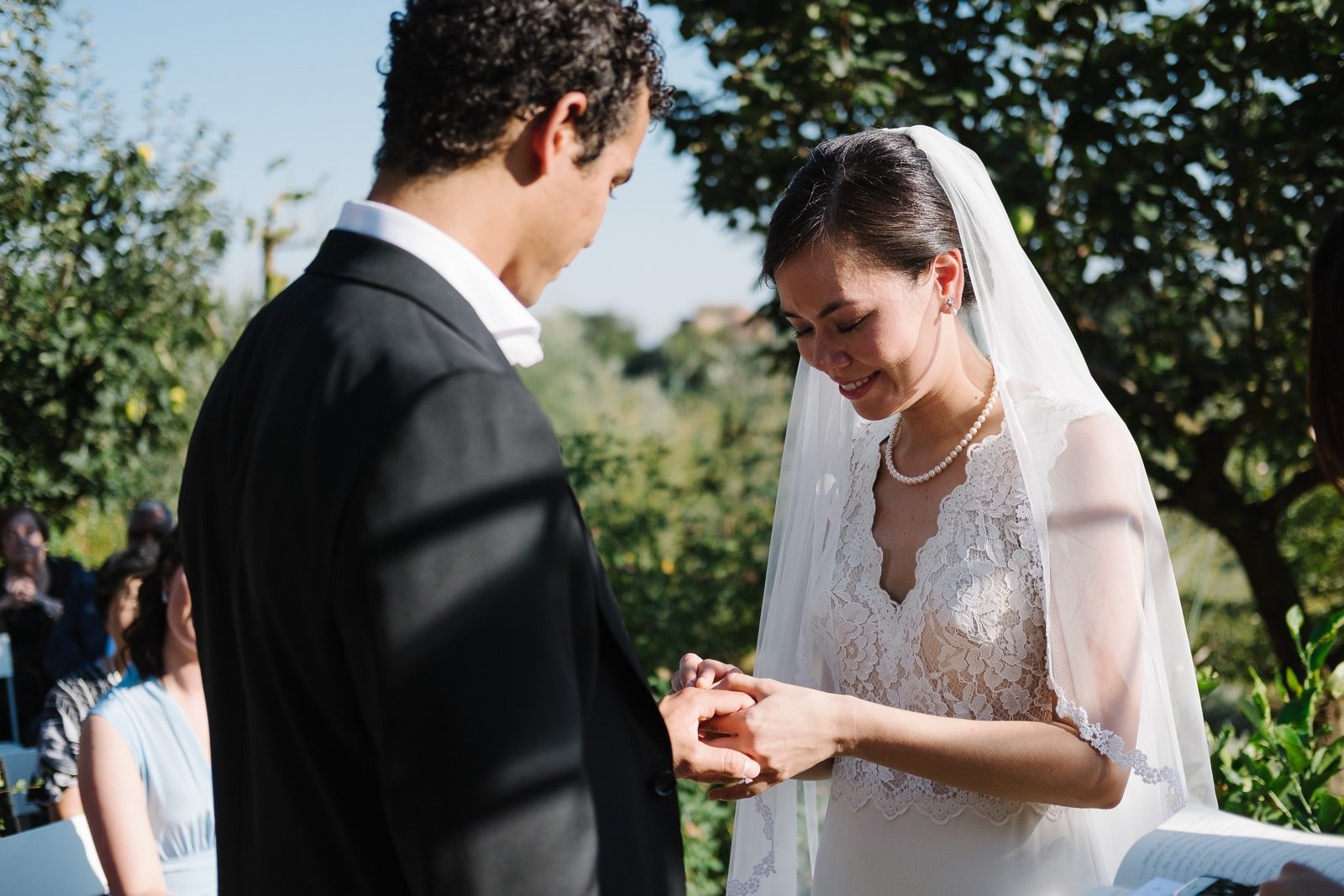 Aileen and Brandon smiling during the vows