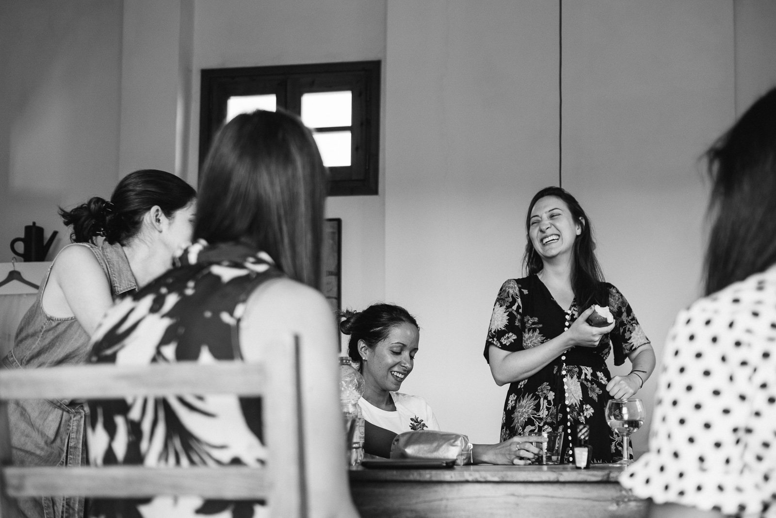 Bride and friends getting ready around the table