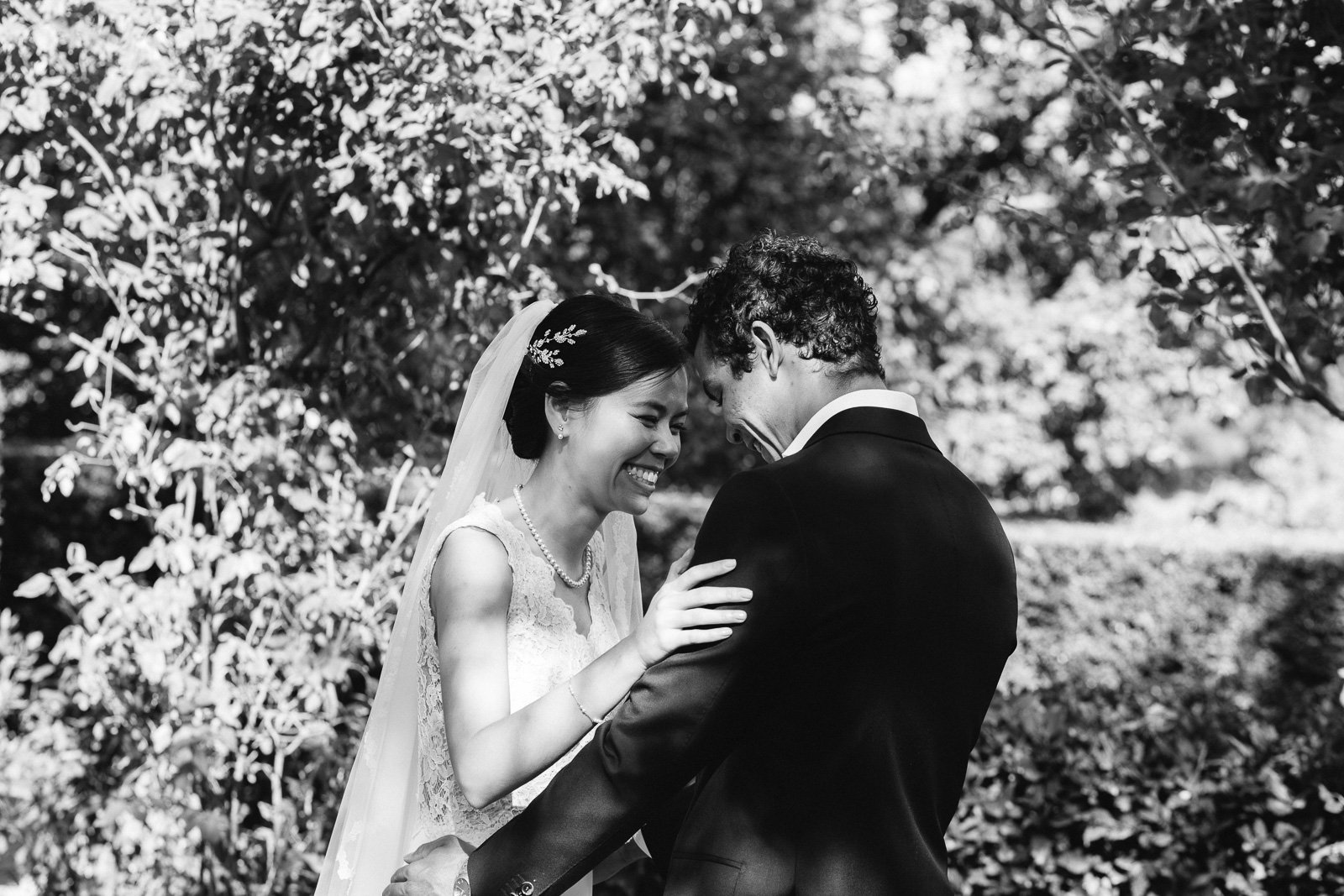 First look between bride and groom, black and white