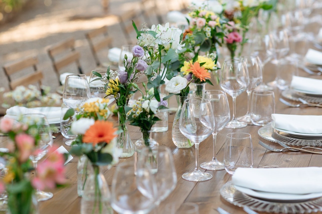 Wedding table with flowers in the garden