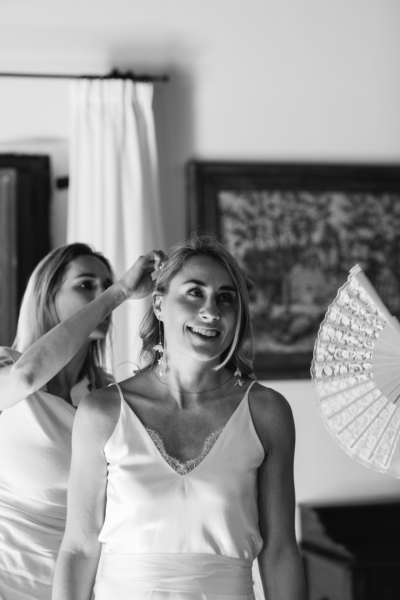 Bridesmaid with a fan, black and white