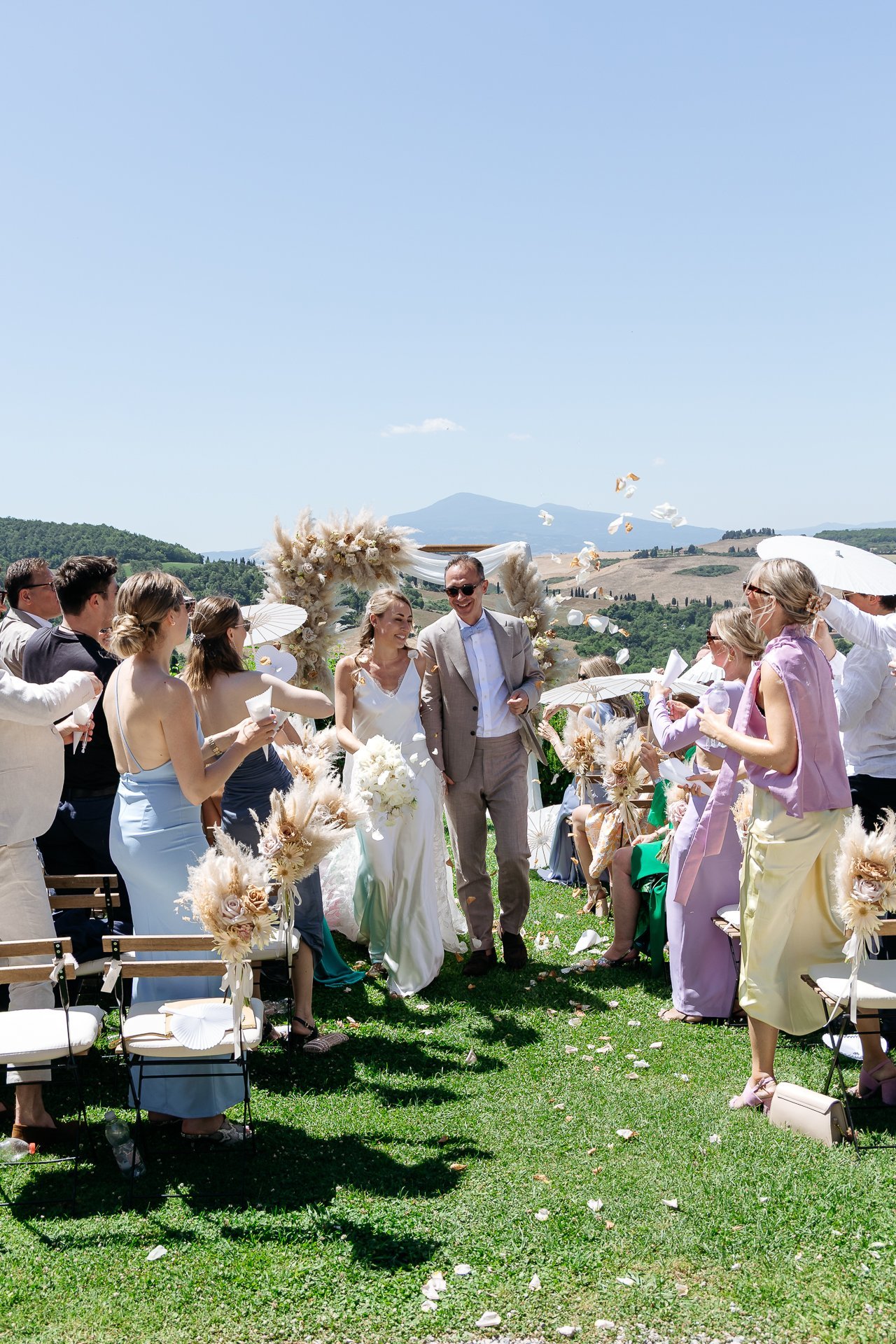 Guests standing at the end of the ceremony
