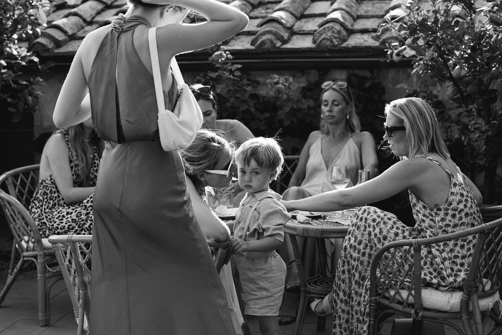 Guests at the aperitivo, black and white