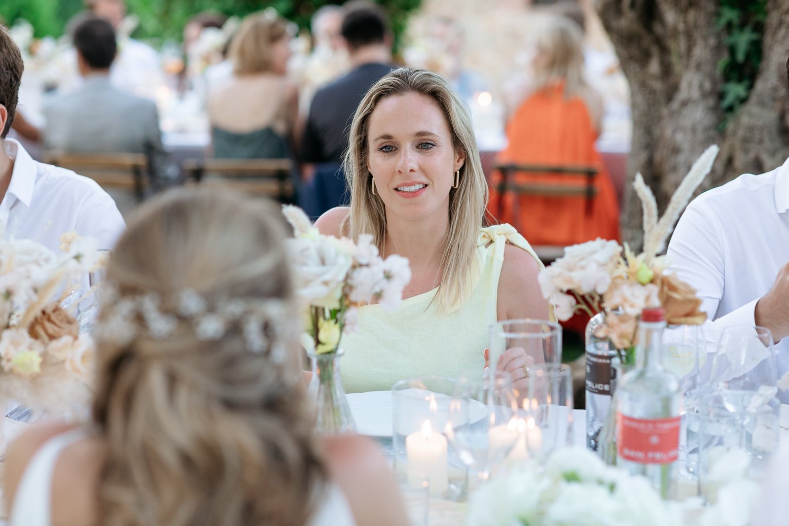 Guests smiling during the speeches
