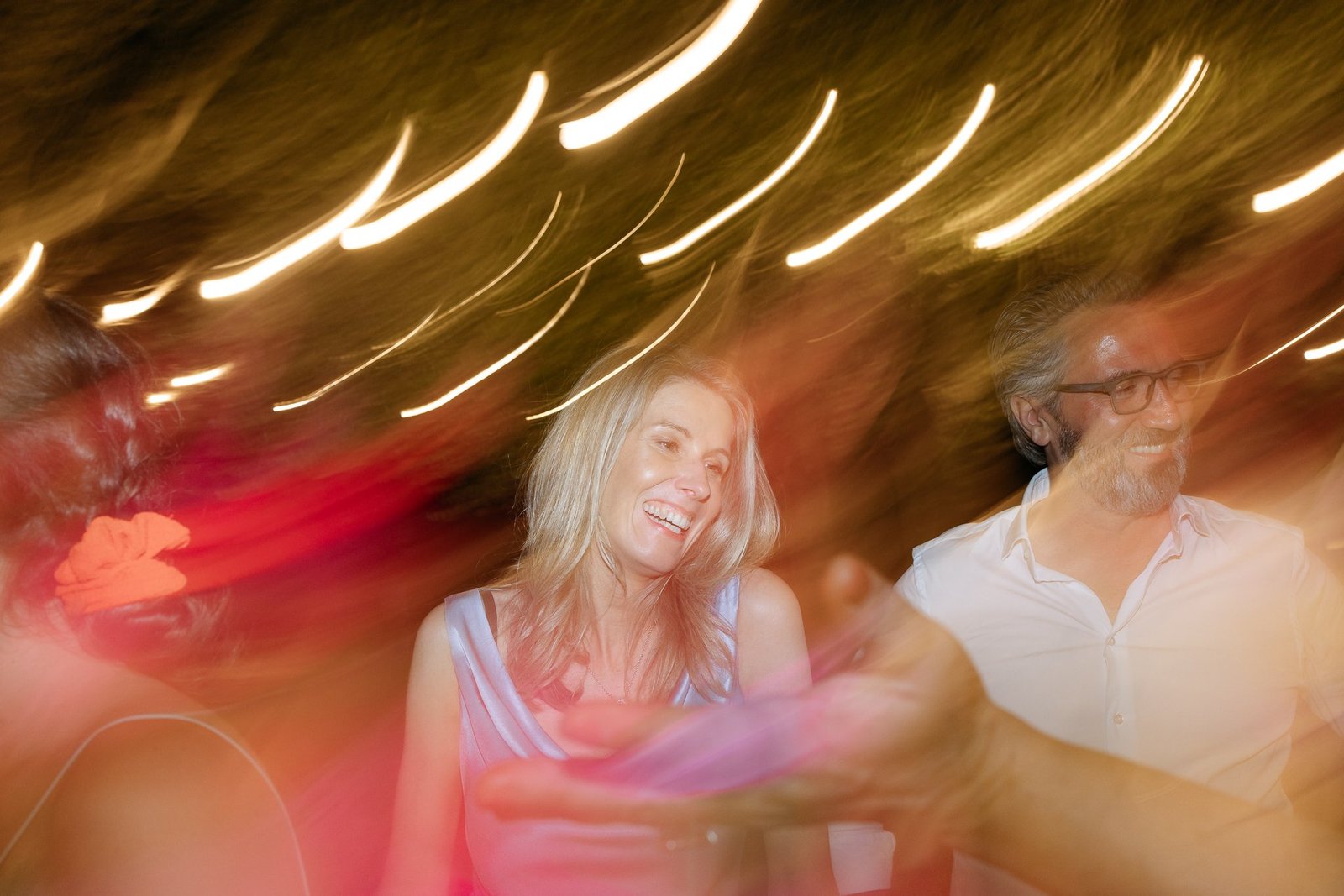 Guests dancing at the party