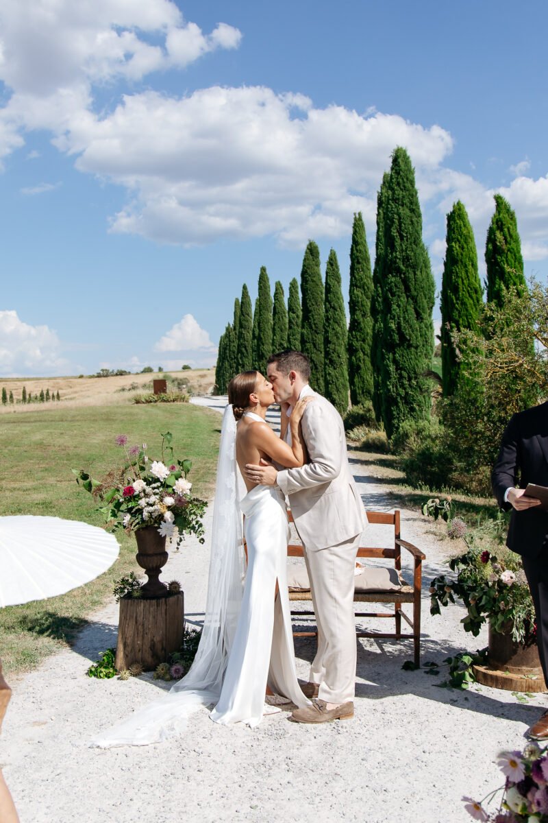 First kiss among the cypresses of the Val d'Orcia