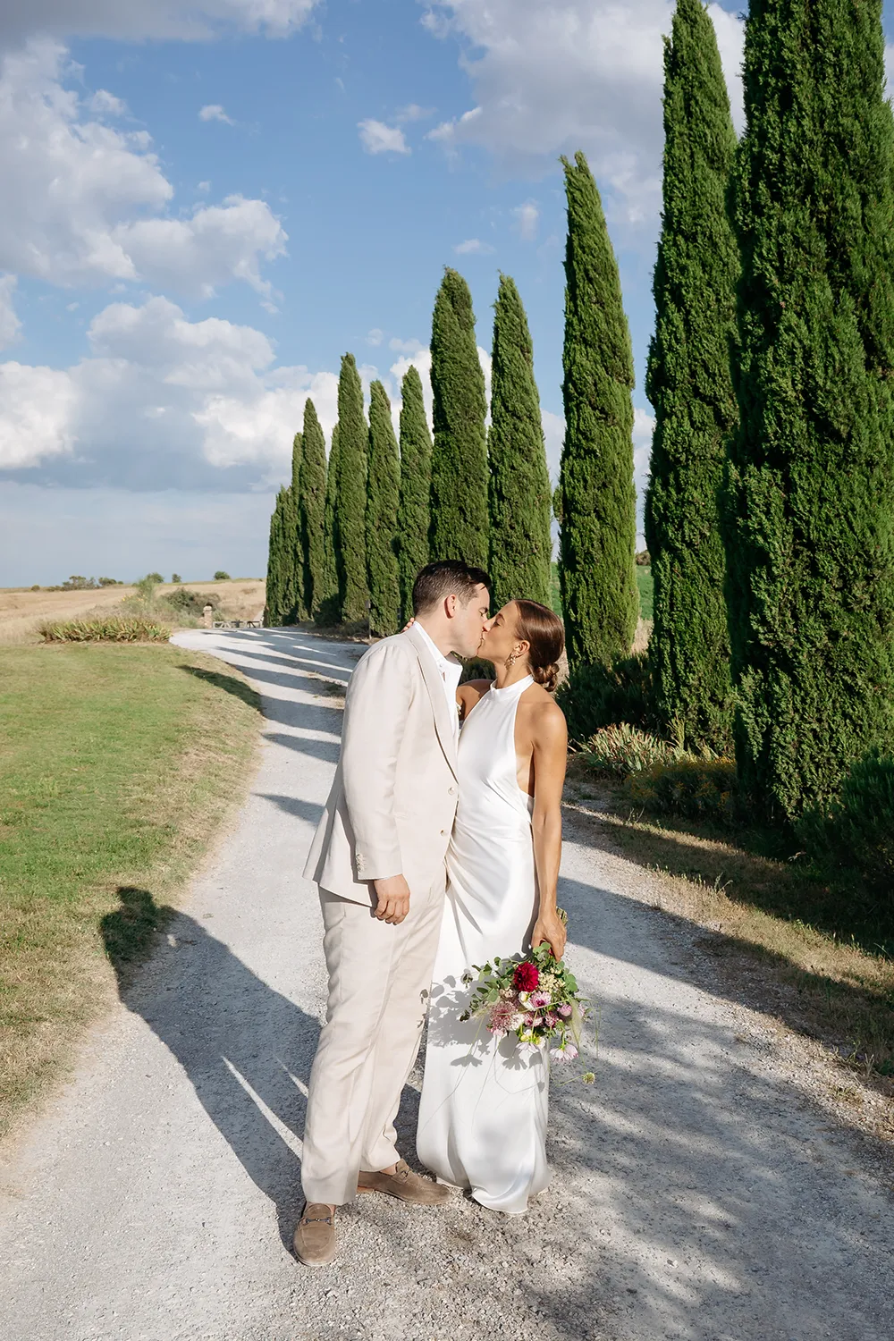 Bride and groom during their sunset portraits in Tuscany